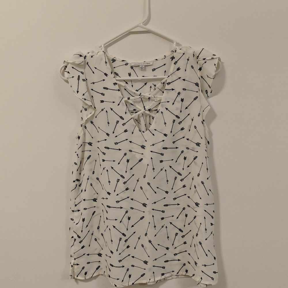 Small, sleeveless top with arrows, size small